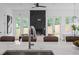 Open-concept living space with a fireplace, view from island sink, and bright dining area at 88 Cleveland Unit B Se St, Atlanta, GA 30316