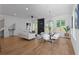 Open-concept living and dining area with hardwood floors and modern furnishings at 88 Cleveland Unit B Se St, Atlanta, GA 30316