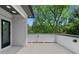 A modern patio with gray siding and concrete flooring at 88 Cleveland Unit B Se St, Atlanta, GA 30316