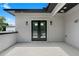 Open-air patio featuring black framed sliding doors and gray concrete flooring at 88 Cleveland Unit B Se St, Atlanta, GA 30316