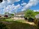 Expansive backyard with a well-manicured lawn and secure fence, ideal for entertaining and outdoor enjoyment at 1093 Spruce Creek Ln, Lawrenceville, GA 30045