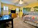 Bedroom with custom whimsical mural, a workspace, and a comfortable bed at 1093 Spruce Creek Ln, Lawrenceville, GA 30045