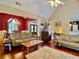 Open-concept living room and dining room with hardwood floors and neutral decor at 1093 Spruce Creek Ln, Lawrenceville, GA 30045