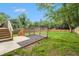 The backyard offers a spacious lawn, newly built patio and privacy fence for outdoor enjoyment at 176 Rhodesia Se Ave, Atlanta, GA 30315