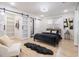 Spacious bedroom with hardwood floors, walk-in closet, and ensuite bathroom at 176 Rhodesia Se Ave, Atlanta, GA 30315