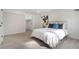 Bright bedroom with light wood floors and a large closet at 176 Rhodesia Se Ave, Atlanta, GA 30315