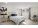 Cozy bedroom featuring hardwood floors, modern decor, and plenty of natural light at 176 Rhodesia Se Ave, Atlanta, GA 30315