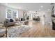 Bright living room with hardwood floors, modern furniture, and an open concept layout at 176 Rhodesia Se Ave, Atlanta, GA 30315