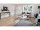 Cozy living room showcasing hardwood floors, elegant decor, and a comfortable seating area at 176 Rhodesia Se Ave, Atlanta, GA 30315