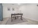 Bright office space with clean lines, features modern decor, a patterned rug, and ample natural light at 176 Rhodesia Se Ave, Atlanta, GA 30315