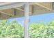 The window has a green lush view of the outside at 176 Rhodesia Se Ave, Atlanta, GA 30315