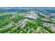 Scenic aerial view of a neighborhood with lush greenery surrounding well-maintained homes at 3689 Spring Hill Se Rd, Smyrna, GA 30080