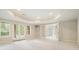 Spacious finished basement with recessed lighting, multiple windows, and walk-out access to the backyard at 3689 Spring Hill Se Rd, Smyrna, GA 30080