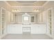Bathroom boasts a double vanity with granite countertop, tiled floor, and decorative mirror with lighting at 3689 Spring Hill Se Rd, Smyrna, GA 30080
