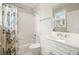 Clean, well-lit bathroom with a shower-tub combo and white vanity with ample counter space at 3689 Spring Hill Se Rd, Smyrna, GA 30080
