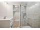 Modern bathroom featuring glass-enclosed shower, and sleek vanity at 3783 Ardsley Ct, Marietta, GA 30062