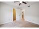 Neutral bedroom shows closet and hallway access with trim and neutral colored walls at 3783 Ardsley Ct, Marietta, GA 30062