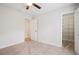 Carpeted bedroom with ceiling fan, closet and connected to a closet and bathroom for added convenience at 3783 Ardsley Ct, Marietta, GA 30062
