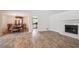 Open living and dining area featuring a fireplace and chandelier at 3783 Ardsley Ct, Marietta, GA 30062
