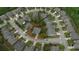 Aerial view of a suburban neighborhood showcasing a home nestled within a cul-de-sac at 6614 Covered Bridge Way, Braselton, GA 30548