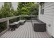Spacious deck perfect for entertaining with comfortable outdoor seating at 6614 Covered Bridge Way, Braselton, GA 30548