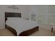 Charming bedroom with large window, comfortable bed, and elegant decor at 6614 Covered Bridge Way, Braselton, GA 30548