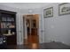Hallway with french doors and elegant wall decor at 6614 Covered Bridge Way, Braselton, GA 30548