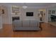 Open-concept living room with fireplace and comfortable seating at 6614 Covered Bridge Way, Braselton, GA 30548
