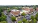 Aerial view of a neighborhood featuring mixed-use buildings and convenient parking at 7235 Cordery Rd, Cumming, GA 30040