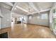 Bright living room features hardwood floors, recessed lighting, and an open floor plan at 7235 Cordery Rd, Cumming, GA 30040
