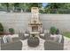 Inviting outdoor space with fireplace and cozy seating at 7235 Cordery Rd, Cumming, GA 30040