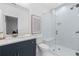 Beautiful bathroom with a glass enclosed shower, vanity, and modern fixtures at 7275 Cordery Rd, Cumming, GA 30040