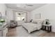 Bright bedroom with neutral décor, ceiling fan, and great natural light at 7275 Cordery Rd, Cumming, GA 30040