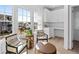 Bright office nook with hardwood floors, white cabinets, and lots of natural light at 7275 Cordery Rd, Cumming, GA 30040