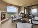 Spacious balcony with a fireplace, grill, and cozy seating, perfect for outdoor entertaining and relaxation at 88 W Paces Ferry # 2230, Atlanta, GA 30305