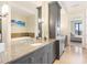 Elegant bathroom with double vanities, granite countertops, and a luxurious bathtub, leading to the main bedroom at 88 W Paces Ferry # 2230, Atlanta, GA 30305