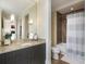 Bathroom featuring granite countertop, undermount sink and bath with shower at 88 W Paces Ferry # 2230, Atlanta, GA 30305
