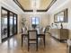 Stylish dining room with balcony access, a modern chandelier, and ample space for entertaining at 88 W Paces Ferry # 2230, Atlanta, GA 30305