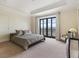 Serene main bedroom with neutral decor, a large window offering scenic views, and elegant furnishings at 88 W Paces Ferry # 2230, Atlanta, GA 30305
