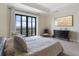 Bright main bedroom featuring a large window with views, neutral tones, and comfortable furnishings at 88 W Paces Ferry # 2230, Atlanta, GA 30305
