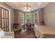 This cozy bedroom includes a vaulted ceiling, wood floors, and neutral walls at 204 Queensbury Ct, Acworth, GA 30102