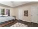 The primary bedroom includes wood floors and a large closet at 204 Queensbury Ct, Acworth, GA 30102