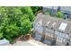 Overhead view of townhomes, showcasing their well-maintained exteriors, peaked roofs, and surrounding greenery at 2093 Callaway Nw Ct, Atlanta, GA 30318