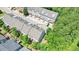 Aerial view of townhome community with manicured landscaping and greenery at 2093 Callaway Nw Ct, Atlanta, GA 30318