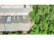 Overhead view of townhome roofing, with lush foliage, street and sidewalk at 2093 Callaway Nw Ct, Atlanta, GA 30318