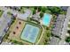 Aerial view of community featuring tennis courts, clubhouse, swimming pool, and residential buildings at 2093 Callaway Nw Ct, Atlanta, GA 30318
