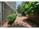 The side yard is fenced and has a mature tree at 2093 Callaway Nw Ct, Atlanta, GA 30318