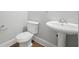 Half bathroom featuring white pedestal sink and modern fixtures at 2093 Callaway Nw Ct, Atlanta, GA 30318