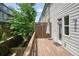 Spacious wooden deck is perfect for outdoor entertaining, with a privacy screen on a sunny day at 2093 Callaway Nw Ct, Atlanta, GA 30318