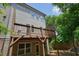 View of the exterior and deck with wooden railings at 2093 Callaway Nw Ct, Atlanta, GA 30318